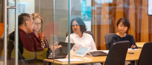 people are meeting in a room