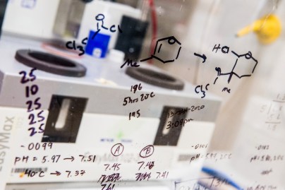Photo from a lab showing equations on glass